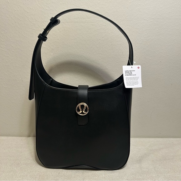 NWT Lululemon Black with Gold Hardware Leather Alternative Shoulder Bag 8L